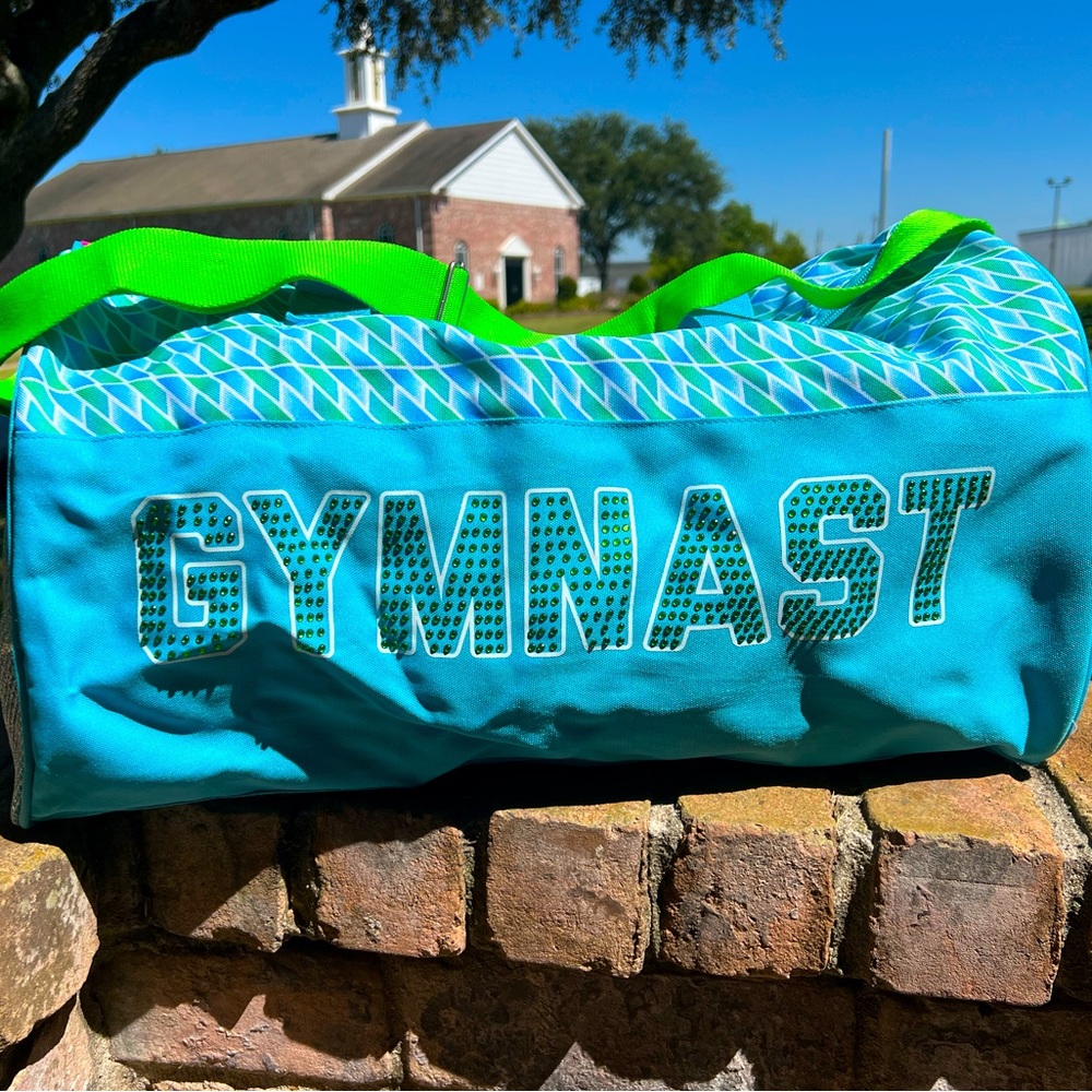 Duffel bag with “GYMNASTS” on the front
